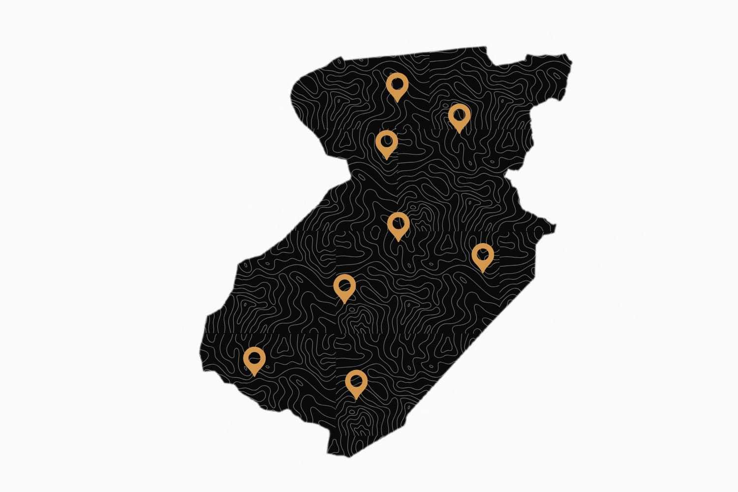 Map outline with contour lines and orange location pins on a black background.