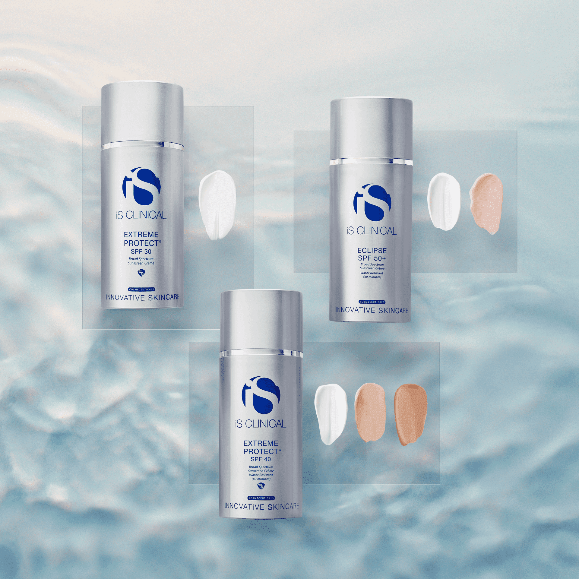 Skincare products on a soft blue textured background with swatches of cream beside each bottle.